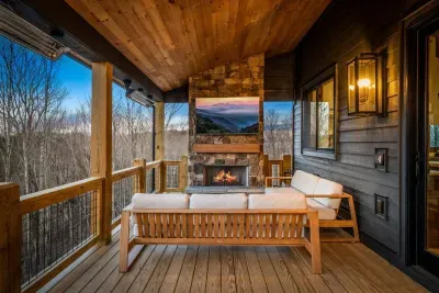 The upper deck offers luxurious Casterly sofas for relaxing while watching the 75" smart TV, with a cozy wood burning and gas fireplace to keep you warm.