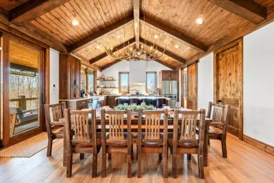 With high ceilings and wood beams, your family and friends will enjoy gathering together with Blue Ridge Mountain views all around.