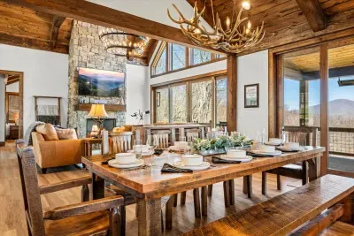The dining table offers mountain views, or views of the latest sports event on the TV.