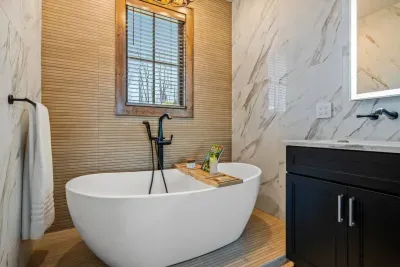 Indulge in a luxurious soaking bathtub, the perfect way to unwind and relax during your vacation.