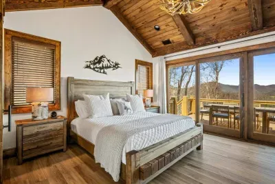 A professionally designed primary bedroom featuring a luxurious Leesa king mattress, rustic timber furniture, and a private ensuite bath.