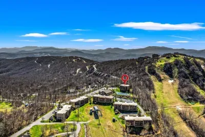 At the top of Oma's Meadow chair lift and adjacent to the other slopes for Sugar Mountain skiing.