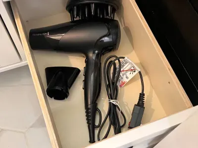 Hair dryer provided in the bathroom
