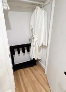 Every bedroom has fresh robes hanging and luggage racks.