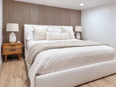 A brand new bedroom was added to the basement and includes a kingsize bed, two nightstands with USB and plug outlets, and a 55" Roku Smart TV.