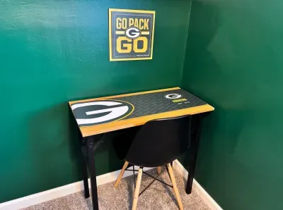 A desk in case you need to do some business while you're visiting.  Outlet right below.