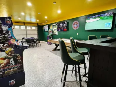 We converted the garage into a Packer game room!