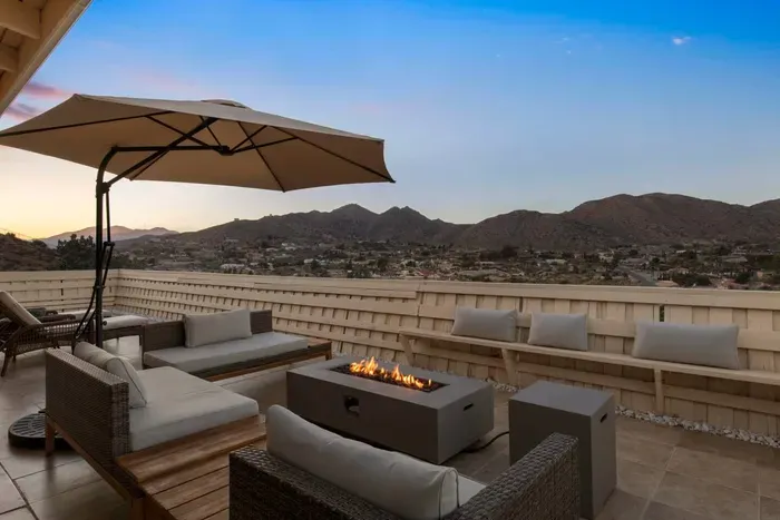 Cantilever umbrella provides shade during hot desert afternoons, while a firepit keeps the fun going for sunset cocktails or night-time stargazing. Dy-no-mite!