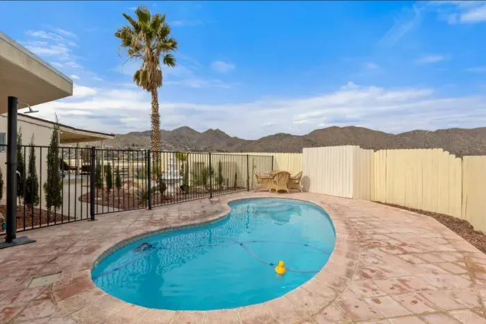 The enclosed yard provides complete privacy from neighbors while you soak up rays by the pool. (Not heated)