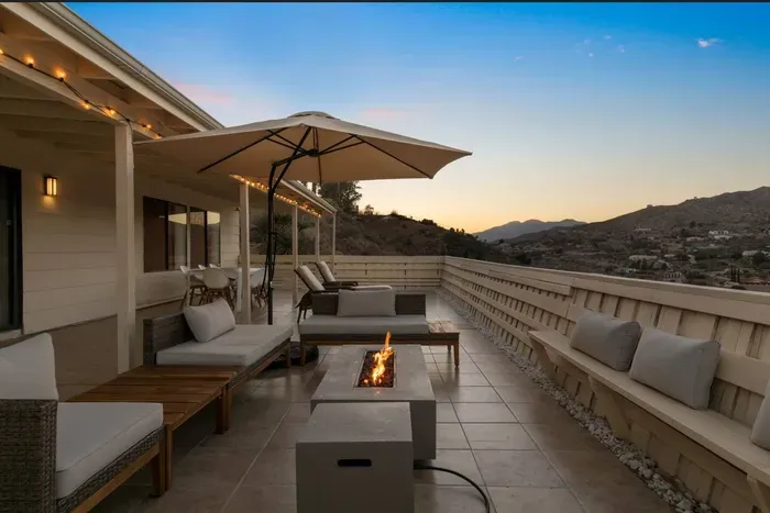 Experience spectacular sunsets behind the mountain range from our primo balcony.