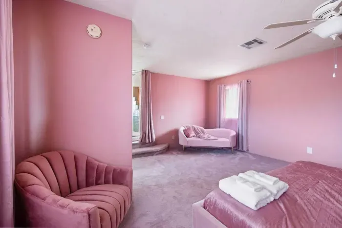 Hubba Hubba! Master Suite includes a fainting couch and club chair for lounging.