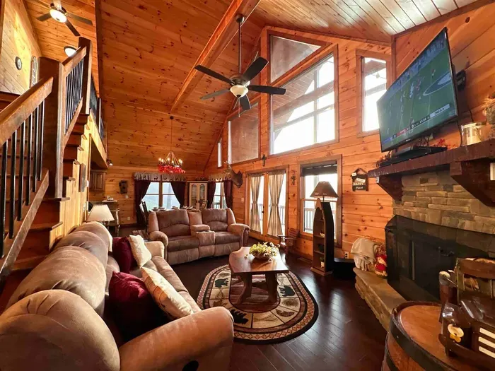 Spacious living room with plenty of seating to watch the big game or have a family movie night.