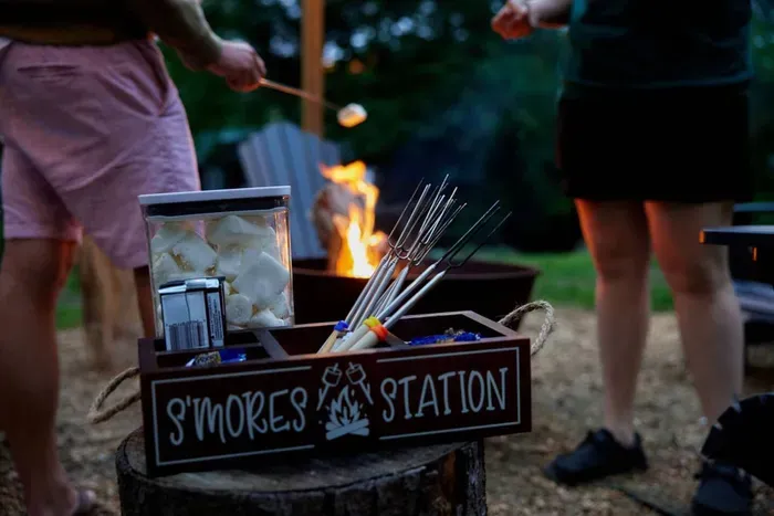 Embrace the cozy ambiance of your open yard as you gather around the crackling fireplace, roasting marshmallows and sharing laughter. Experience the warmth of the fire and the joy of togetherness in this delightful outdoor setting.