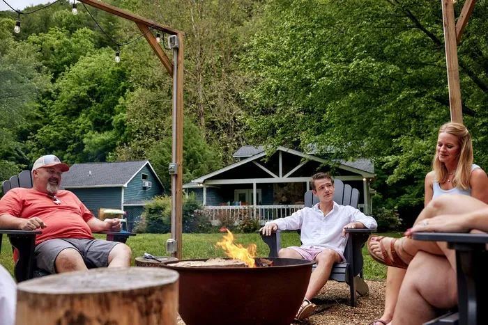 Create lasting memories in your inviting backyard oasis, where laughter fills the air as you gather around a cozy fire