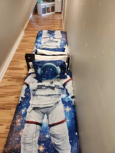 Two twin beds in the bunk room.