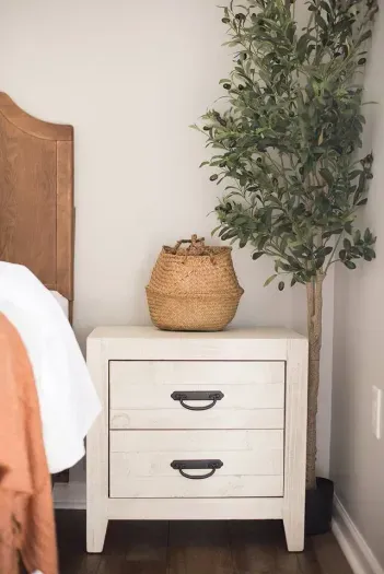 Useful side tables by the side of the beds