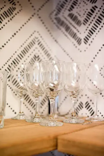 A set of exquisite wine glasses, perfect for savoring moments of indulgence and relaxation