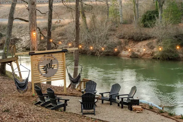 Great firepit area by the river, we do ask guests to provide their own firewood