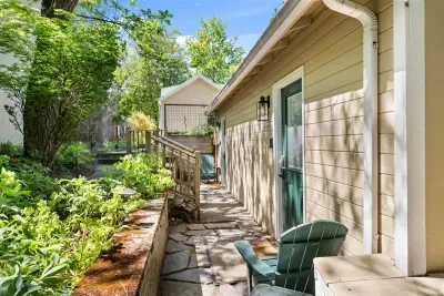 Steps down to both studios from parking area