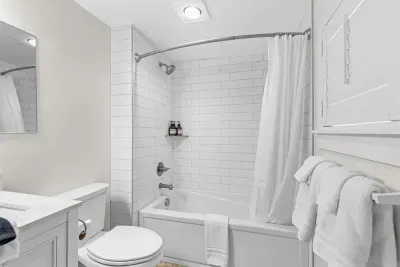 Newly renovated bathroom with bathtub