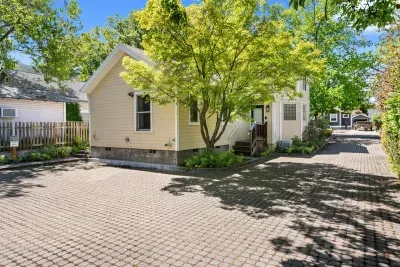 Two off street parking spots in between house and studios