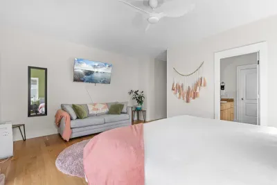 2nd master bedroom with french doors to pool