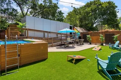 Entertaining backyard with seasonal pool, BBQ, games and a picnic table