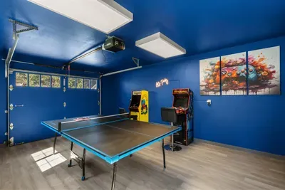 Game room with ping pong table and 2 arcades!
