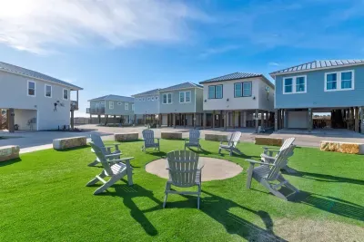 Large, turfed area across from the home