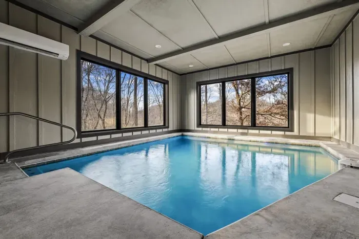 Serene swims, rain or shine, your private indoor pool retreat.