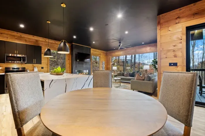 Dining table for 4 guests plus seating for 4 guests at the island/bar area