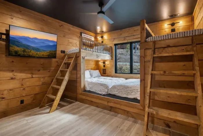 Bunk Room with two queen beds on the bottom and two twin beds on top.