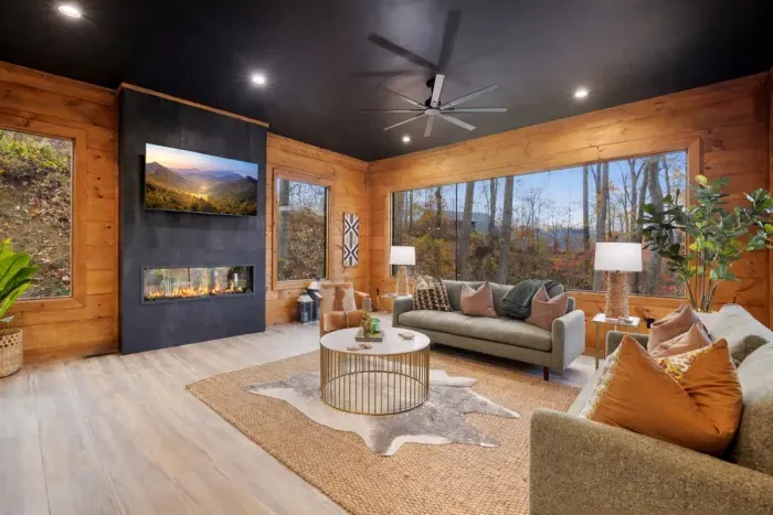 Large, spacious living area with electric fireplace.