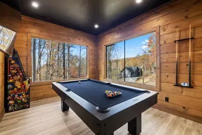 Game room with pool table and 60 game multicade