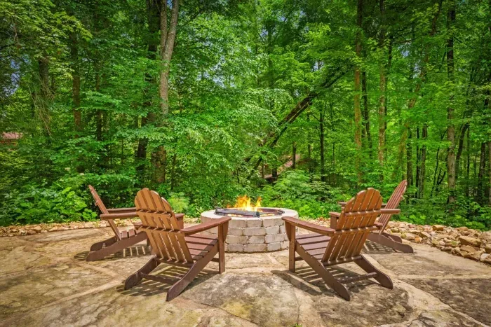 Fire Pit area with wooded view. Please provide your own firewood.