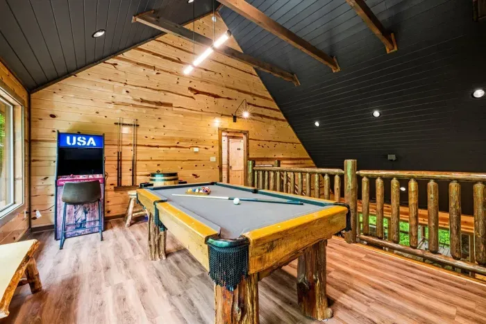 Game Room with pool table and arcade machines