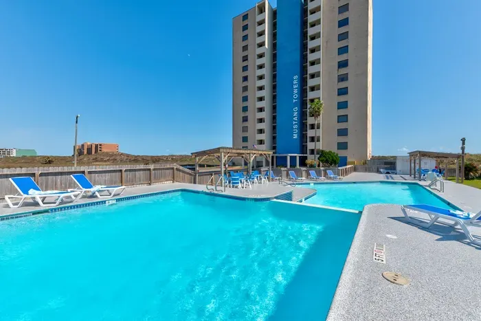 Resort-style pool with plenty of seating