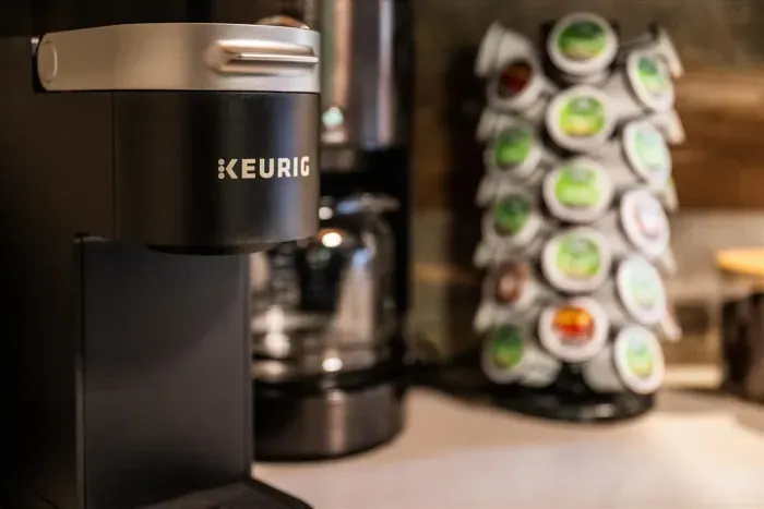 We provide a Keurig, drip coffee machine, coffee grinds, and k-cups