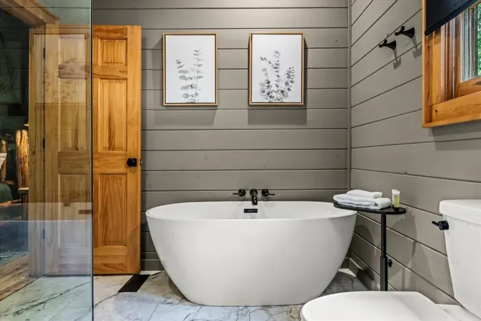 Ensuite bathroom with tub and shower