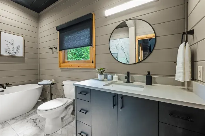 Ensuite bathroom with tub and shower