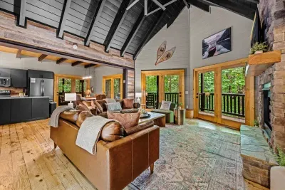 Large living area with ample seating and cathedral ceilings