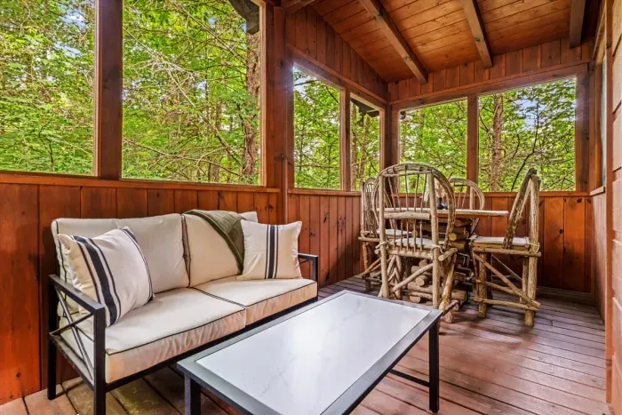 Screened in sitting area and table