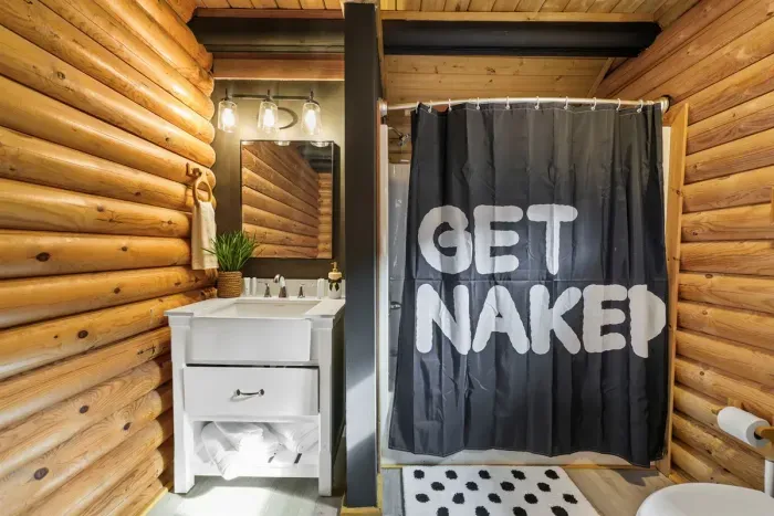 Full bathroom located on the second level next to the kitchen.