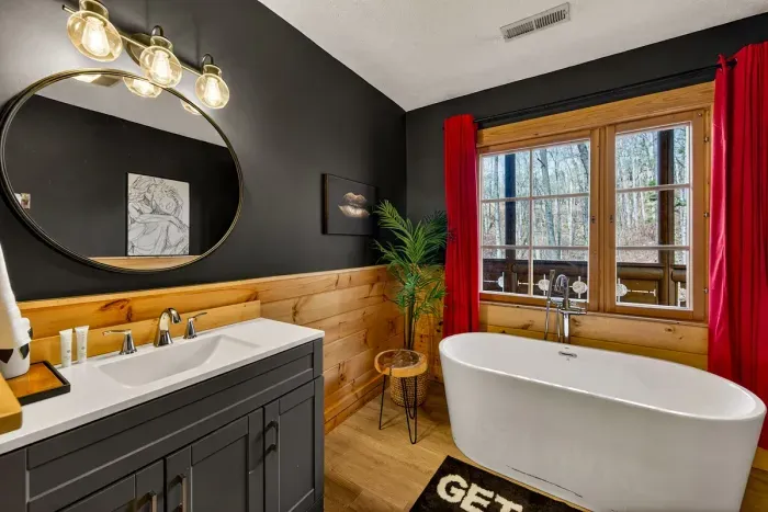 Ensuite full bathroom next to primary bedroom.