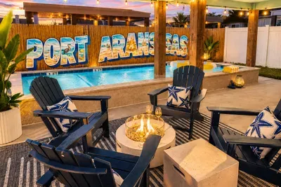 Fire pit with seating right next to the pool