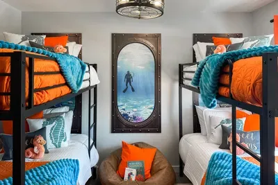 Kids bunk room with an underwater/submarine design
