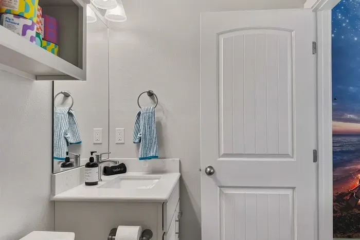 One of three full bathrooms