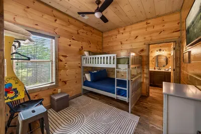 Bunk Room with double over double beds located on the lower level. With ensuite bathroom