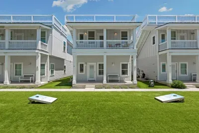 Large outdoor, turfed area in front of the home. Perfect for the kids to throw a football or toddlers to run around.