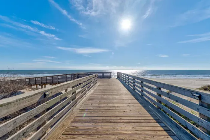 Golf cart friendly boardwalk to the beach